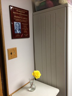 plaque and flower in memorium